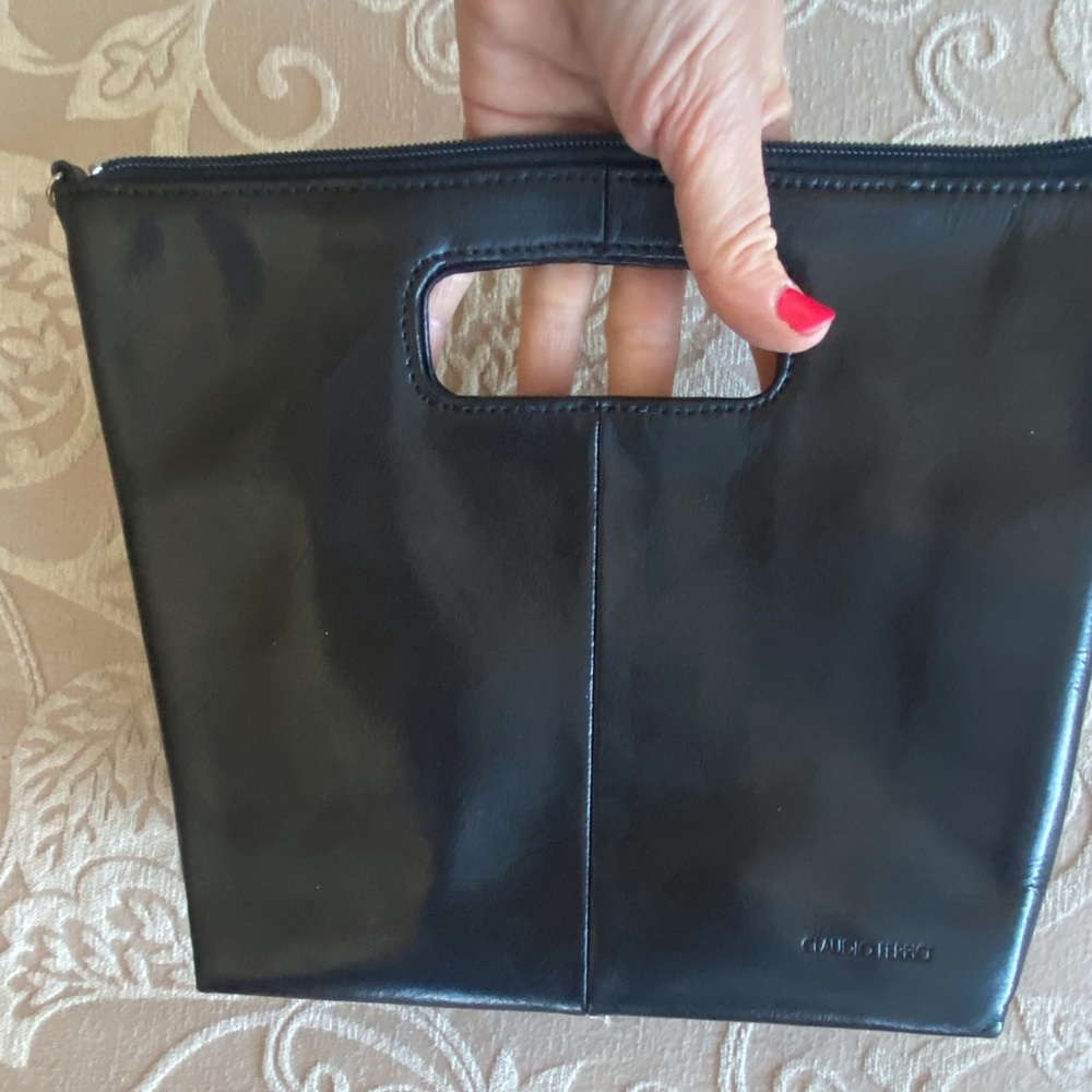 Claudio Ferrici hand clutch bag